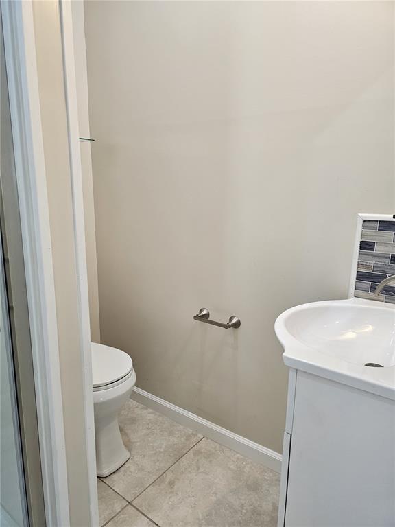 20805 Sheldon Street Orlando, FL 32833 - Photo 24 of 33 a bathroom with a sink and a toilet