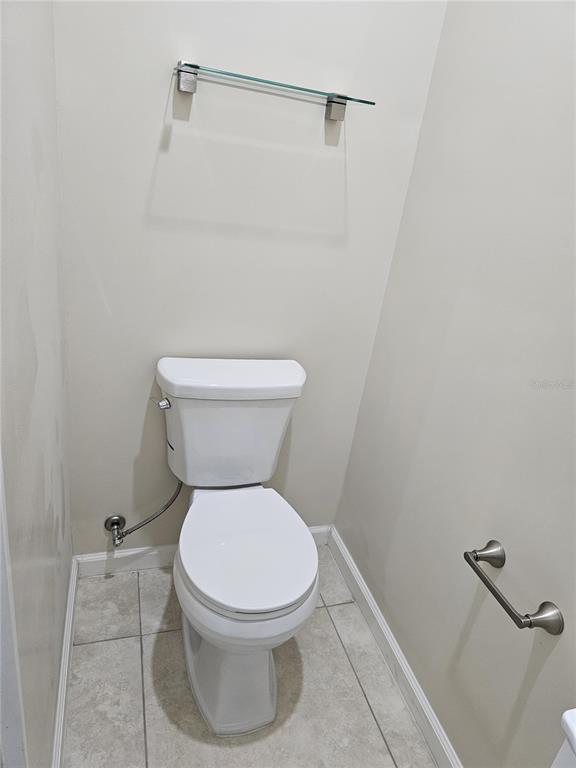 20805 Sheldon Street Orlando, FL 32833 - Photo 25 of 33 a white toilet sitting next to a shower