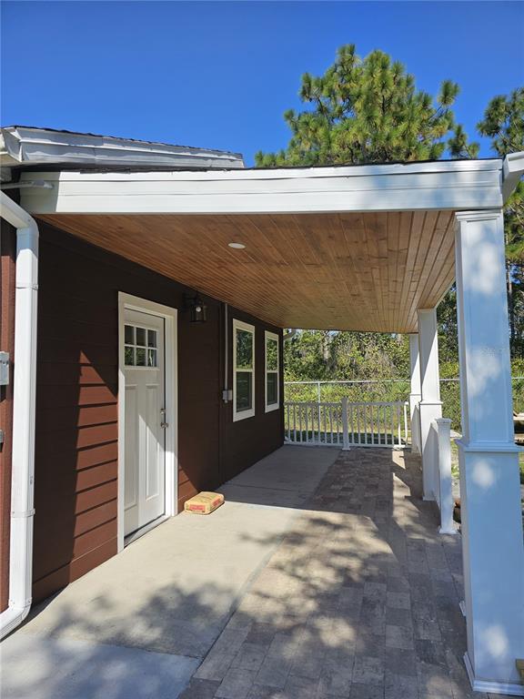 20805 Sheldon Street Orlando, FL 32833 - Photo 30 of 33 a view of a house with a outdoor space