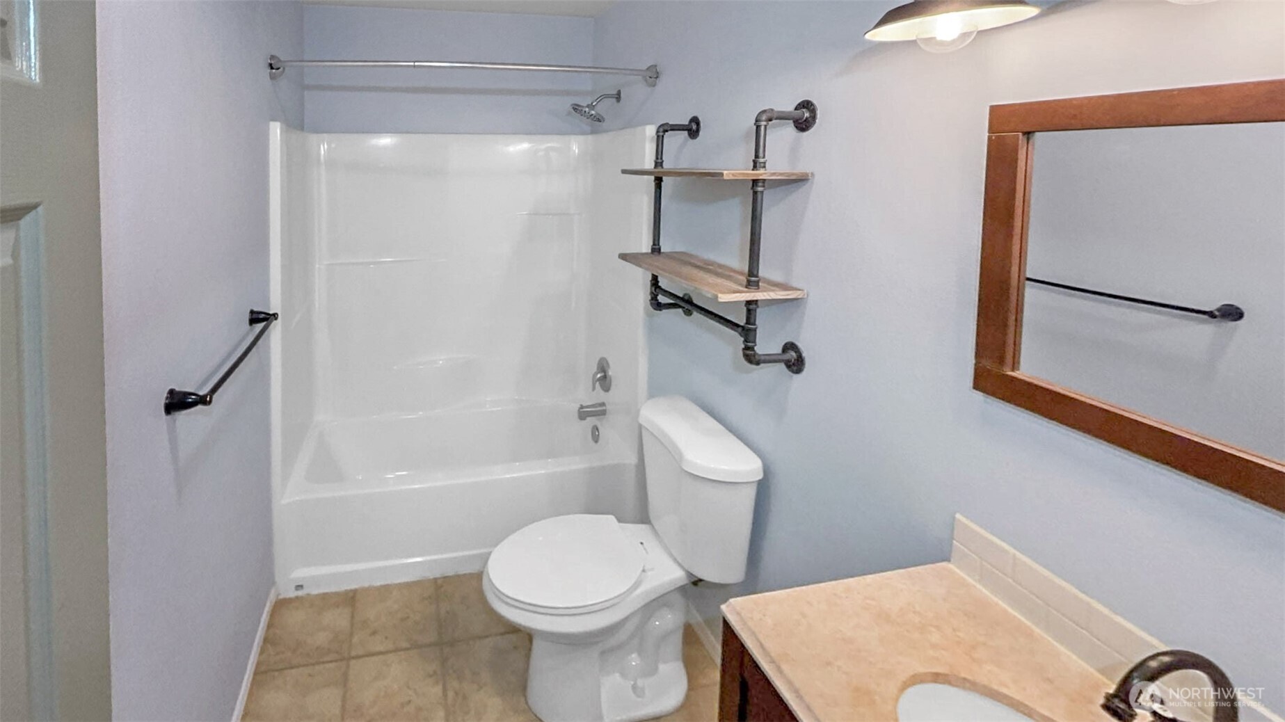 280 Devonshire Road Montesano, WA 98563 - Photo 11 of 20 a white toilet sitting next to a bath tub