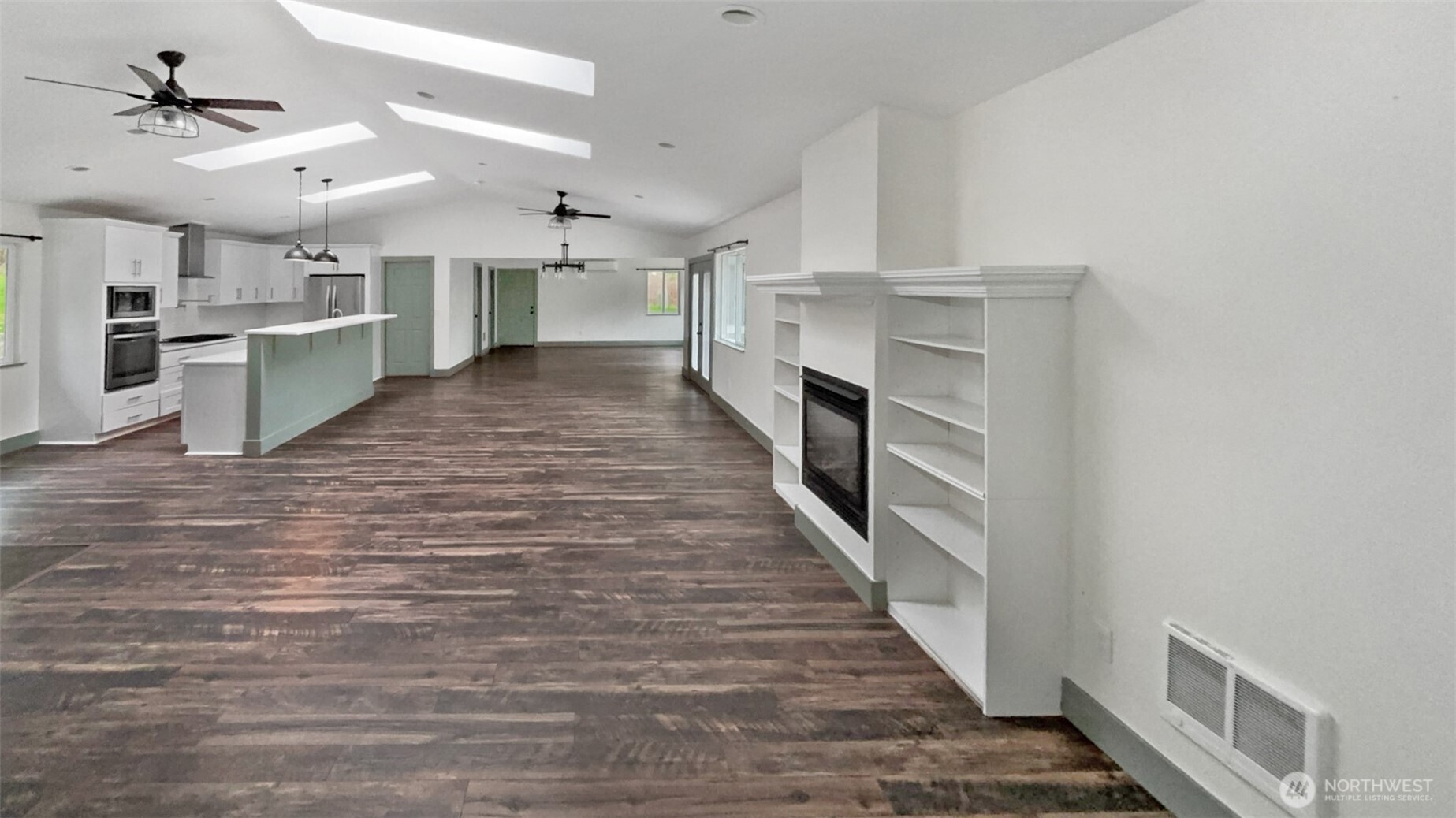 280 Devonshire Road Montesano, WA 98563 - Photo 14 of 20 a view of a kitchen with cabinets and wooden floor