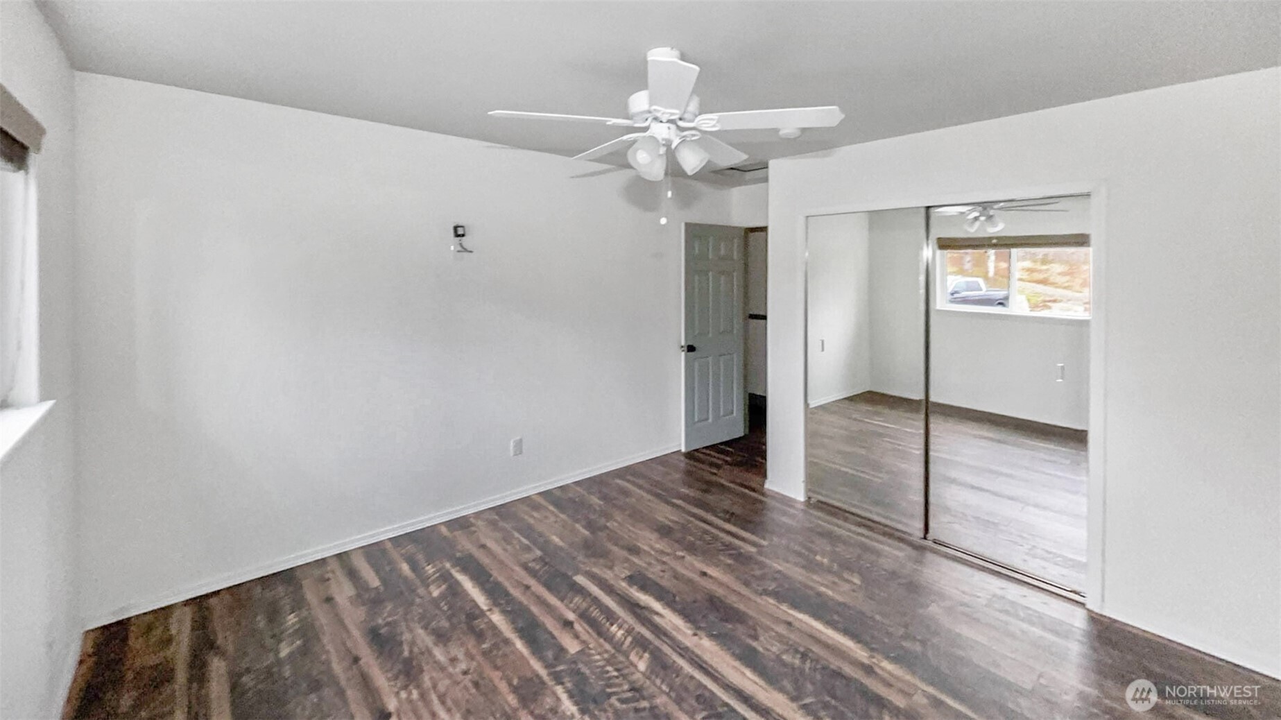 280 Devonshire Road Montesano, WA 98563 - Photo 16 of 20 wooden floor in an empty room with a window