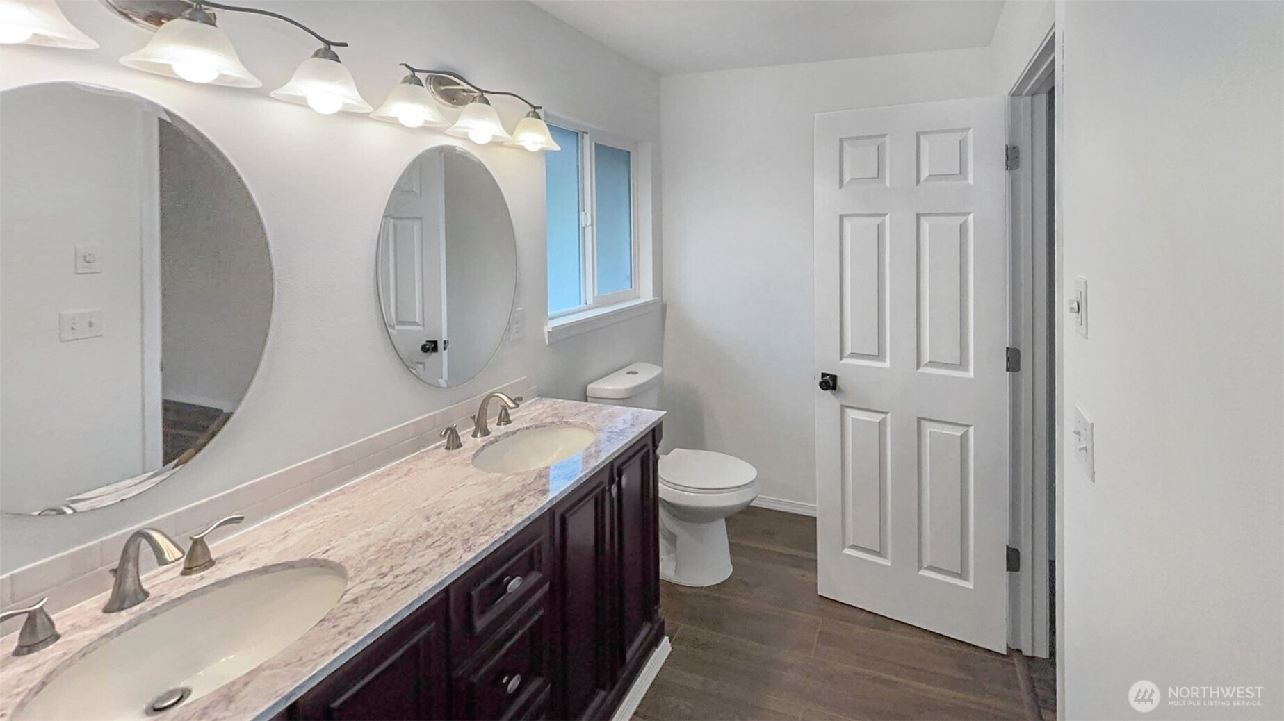 280 Devonshire Road Montesano, WA 98563 - Photo 8 of 20 a en suite bathroom with a granite countertop double vanity sink and a mirror