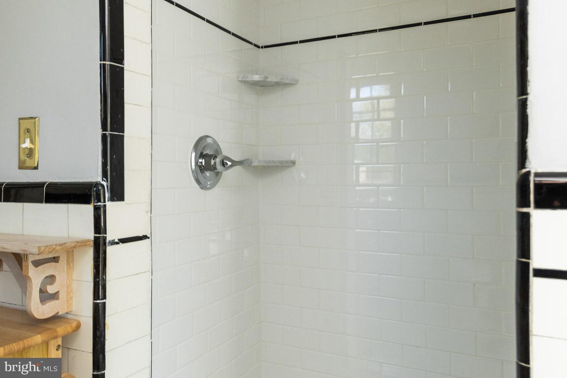 2418 Briarwood Road Baltimore, MD 21209 - Photo 28 of 55 a bathroom with a shower