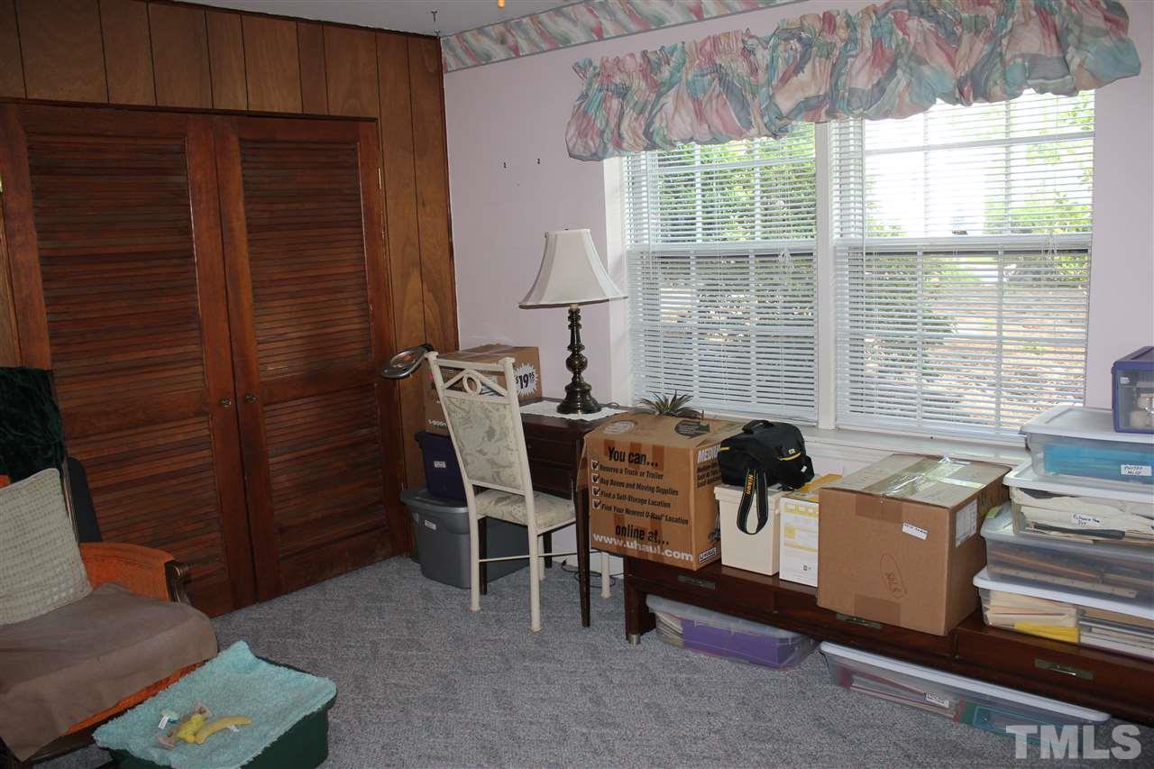 816 Macon Place Raleigh, NC 27609 - Photo 12 of 17 a dining room with furniture and a window