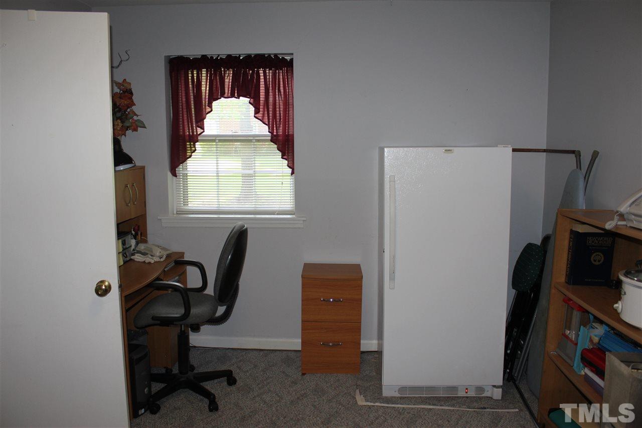 816 Macon Place Raleigh, NC 27609 - Photo 13 of 17 a workspace with furniture and a window
