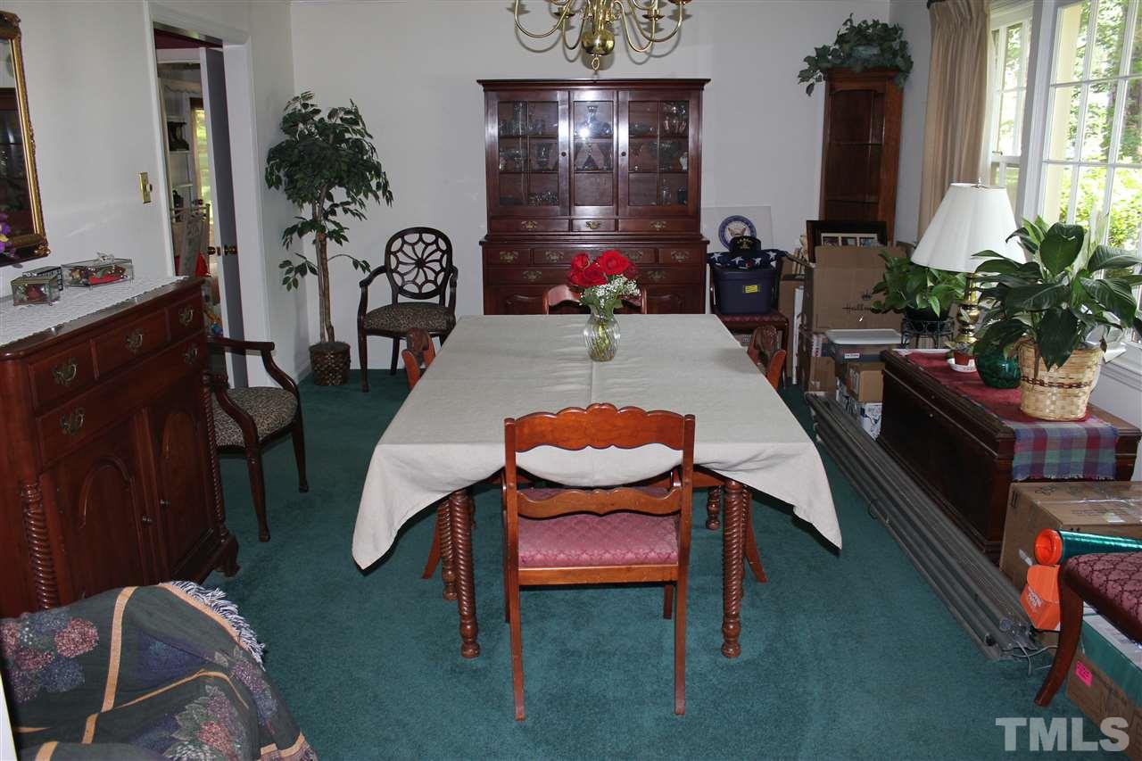 816 Macon Place Raleigh, NC 27609 - Photo 5 of 17 a dining room with furniture and window