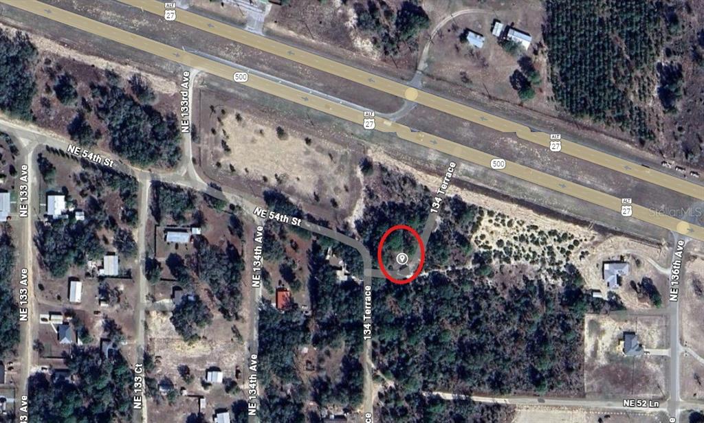 a front view of a building with a lot of lights