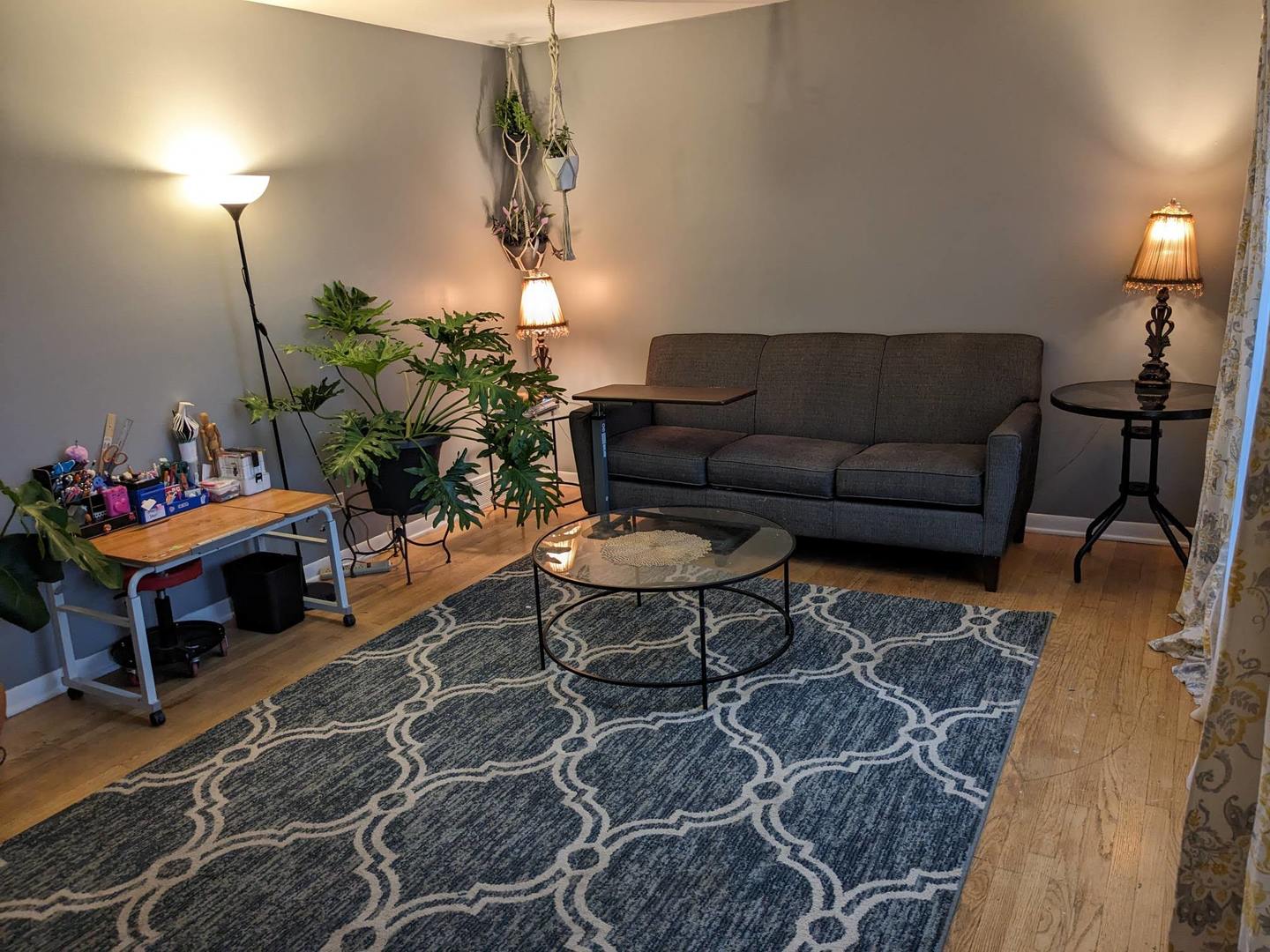 10828 Rutherford Avenue Worth, IL 60482 - Photo 4 of 25 a living room with furniture a lamp and a chandelier