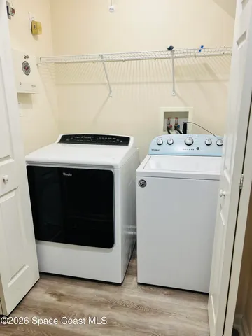a utility room with a washer and dryer