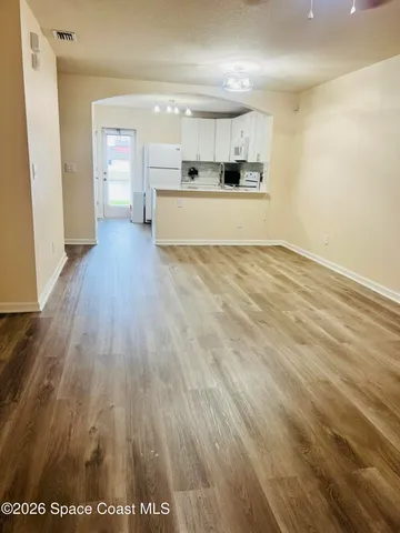 a large room with wooden floor