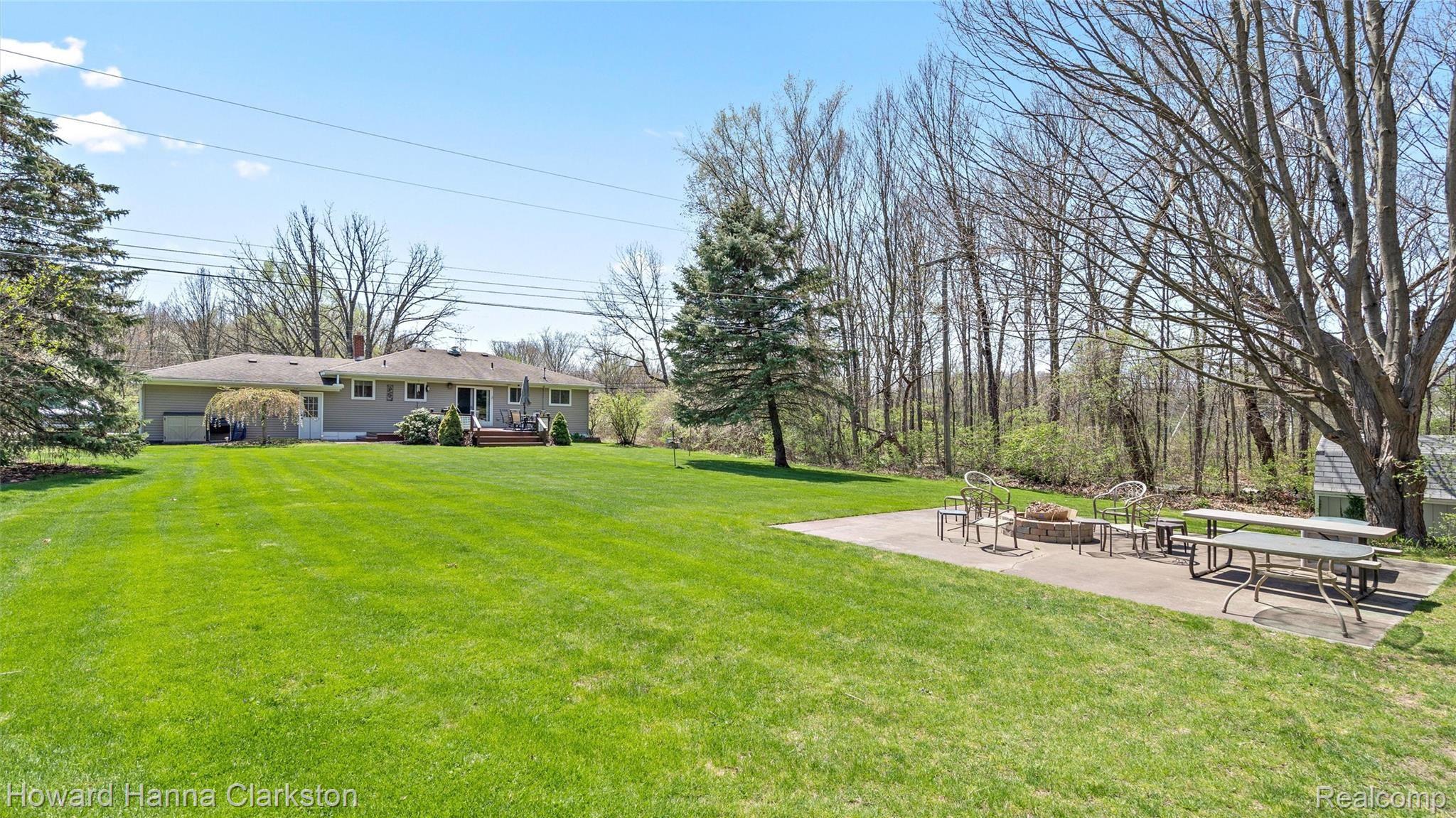 5122 Waldon Road Clarkston, MI 48348 - Photo 21 of 21 Large backyard; private fire pit