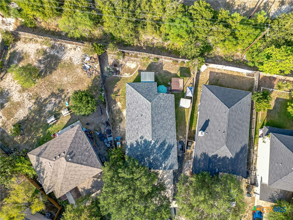 2369 Carson Loop New Braunfels, TX 78130 - Photo 22 of 28 an aerial view of a house with a yard basket ball court and outdoor seating