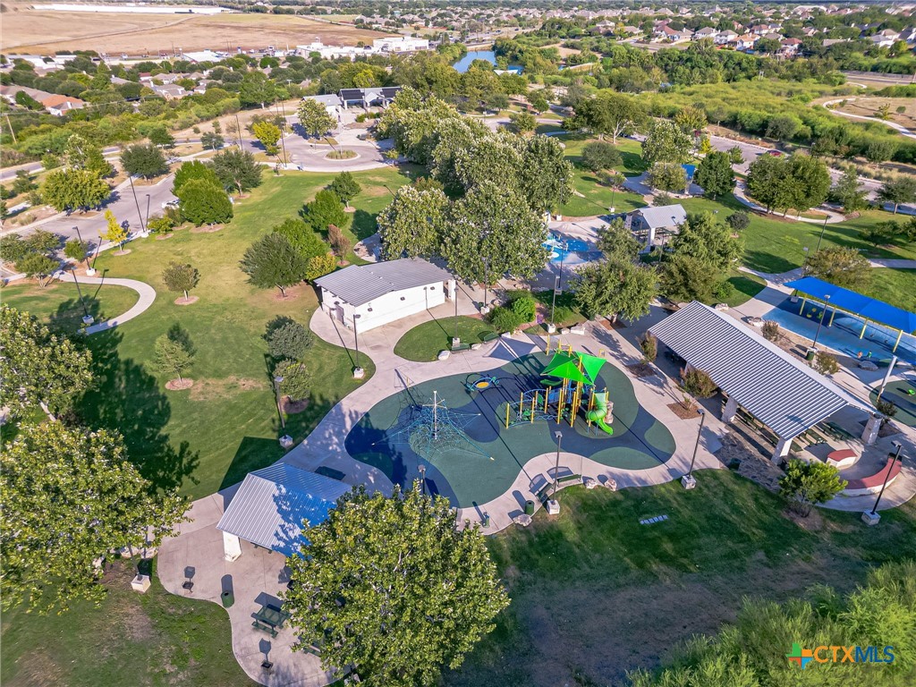 2369 Carson Loop New Braunfels, TX 78130 - Photo 25 of 28 an aerial view of residential houses with outdoor space and parking