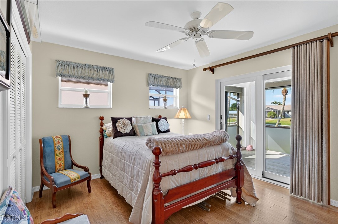 4306 Southwest 3rd Avenue Cape Coral, FL 33914 - Photo 19 of 50 a bed room with a bed and a chair