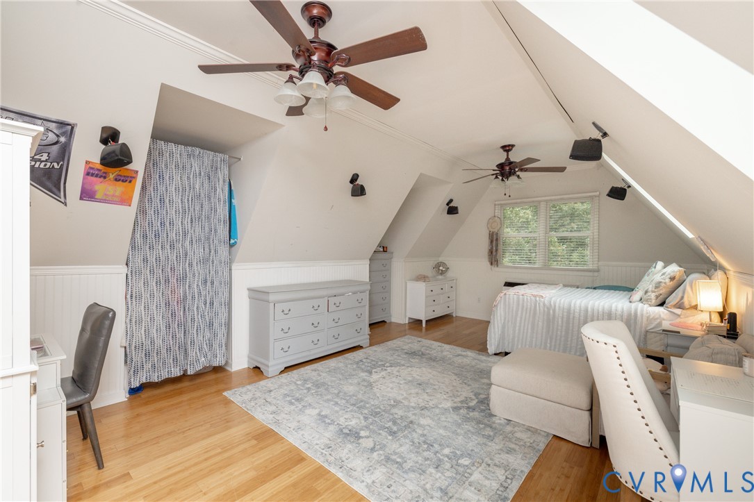 4201 Hunters Ridge Drive Moseley, VA 23120 - Photo 34 of 39 Bedroom featuring a wainscoted wall, a skylight, c