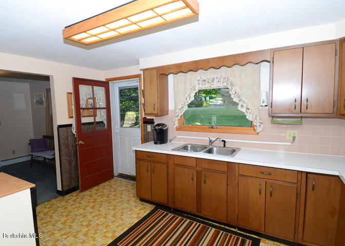 3759 Hancock Road Hancock, MA 01237 - Photo 14 of 30 a kitchen with a sink and cabinets