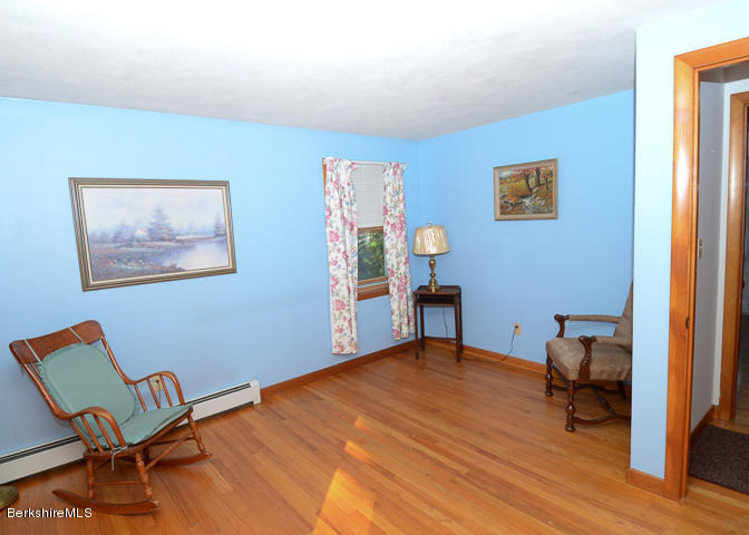 3759 Hancock Road Hancock, MA 01237 - Photo 18 of 30 a bedroom with a workspace and a window
