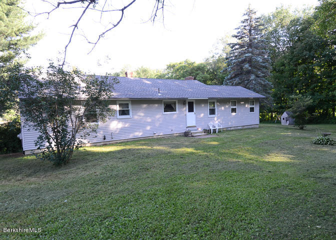 3759 Hancock Road Hancock, MA 01237 - Photo 3 of 30 a front view of a house with garden