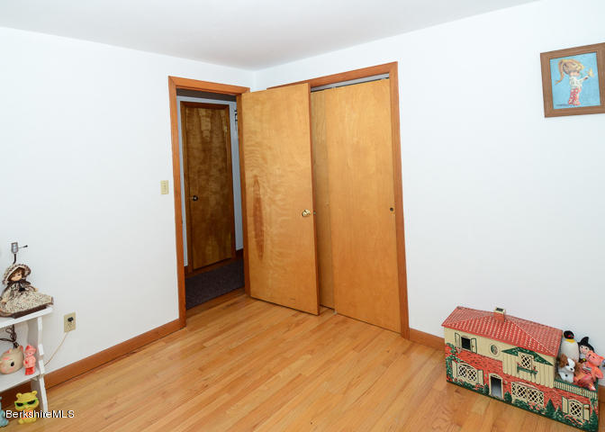 3759 Hancock Road Hancock, MA 01237 - Photo 22 of 30 a view of room with yard and wooden floor