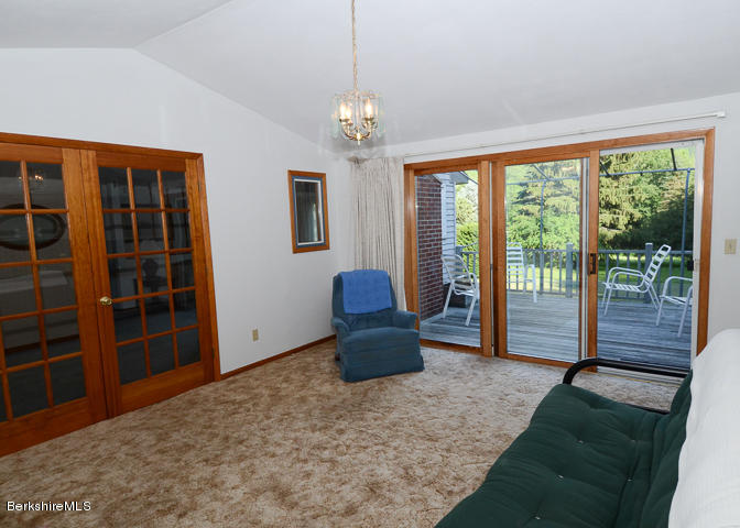3759 Hancock Road Hancock, MA 01237 - Photo 8 of 30 a living room with furniture and windows