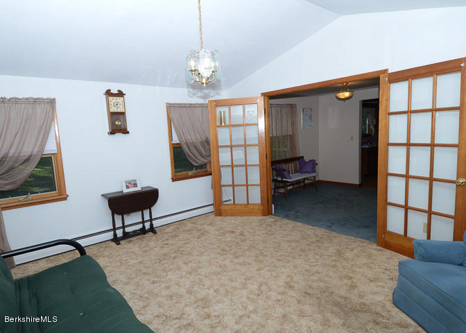 3759 Hancock Road Hancock, MA 01237 - Photo 9 of 30 a bedroom with furniture and a window