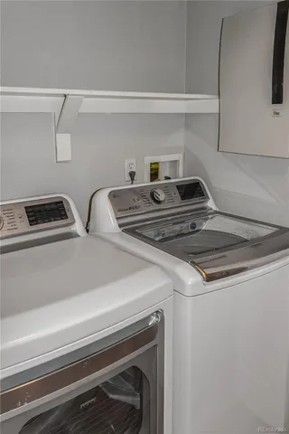a close view of laundry room with washer and dryer