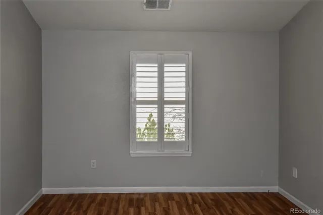 a view of a room that has a window in it