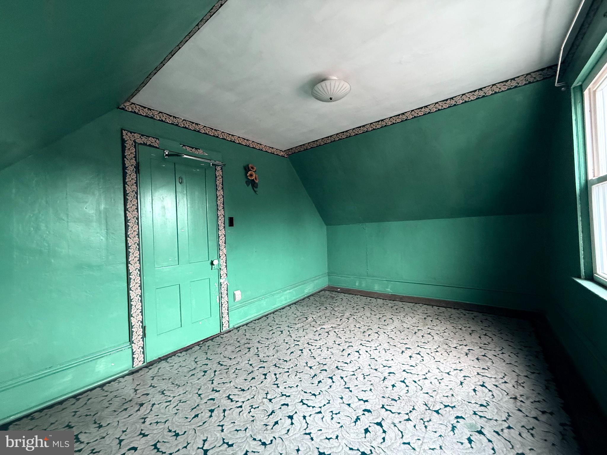 439 Bayard Street Kane, PA 16735 - Photo 15 of 22 a view of a room with a large window and a small yard