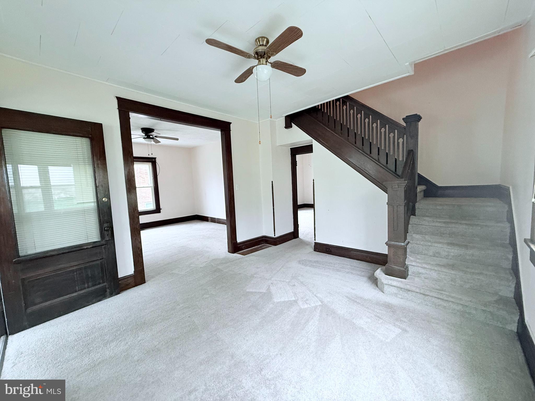 439 Bayard Street Kane, PA 16735 - Photo 4 of 22 a view of a livingroom with a staircase