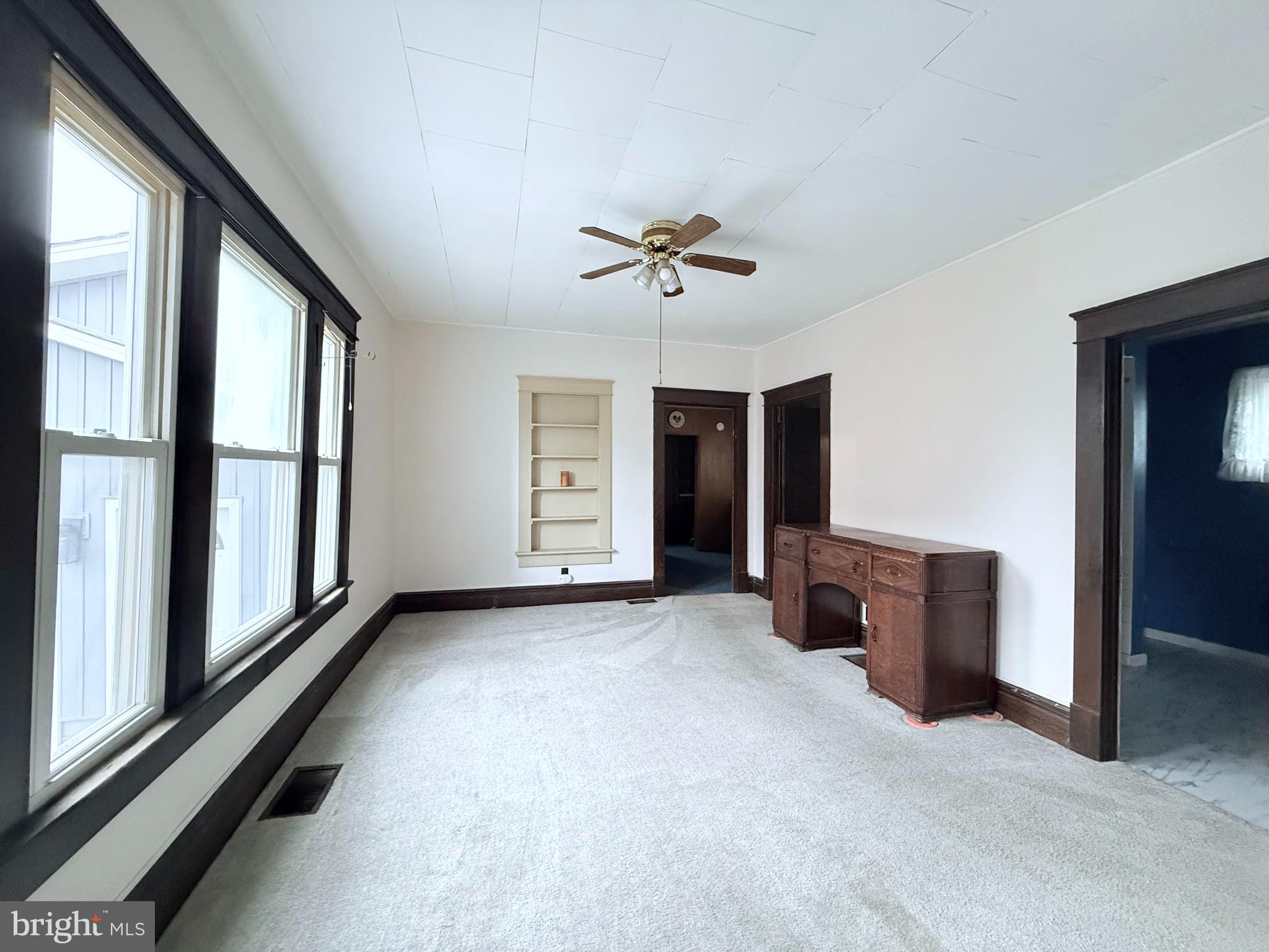 439 Bayard Street Kane, PA 16735 - Photo 8 of 22 an empty room with windows and closet