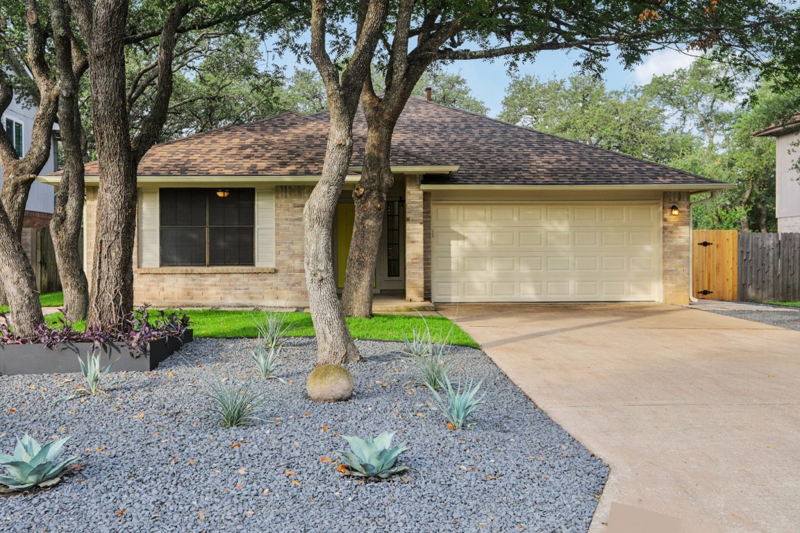 3103 Pepper Grass Trail Cedar Park, TX 78613 - Photo 1 of 1 a front view of a house with garden
