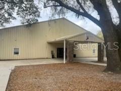 an entrance to house with yard