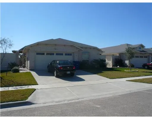 a car parked in front of a house