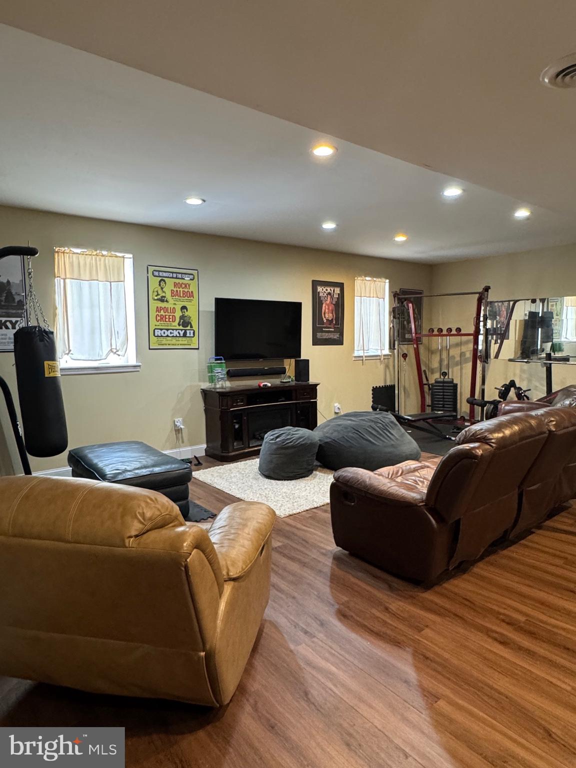 5432 Lake Road Newfield, NJ 08344 - Photo 18 of 24 a living room with furniture and a flat screen tv