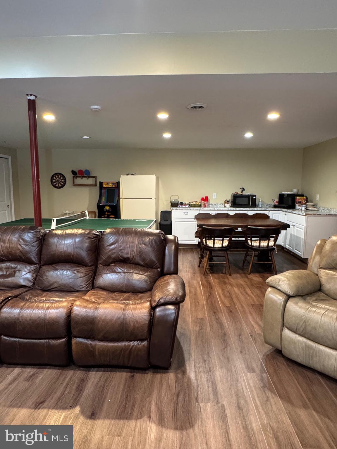 5432 Lake Road Newfield, NJ 08344 - Photo 19 of 24 a living room with furniture and kitchen view