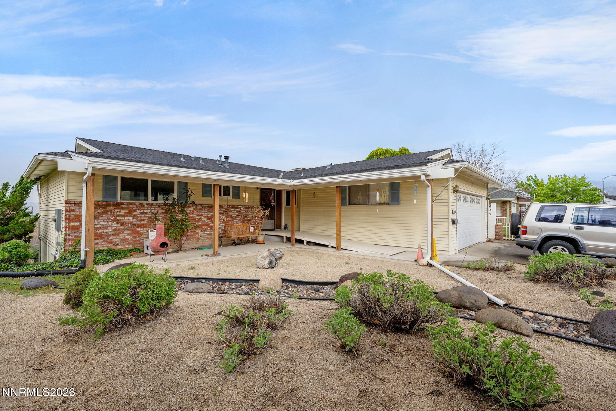 2685 Everett Drive Reno, NV 89503 - Photo 1 of 40 a front view of a house with garden