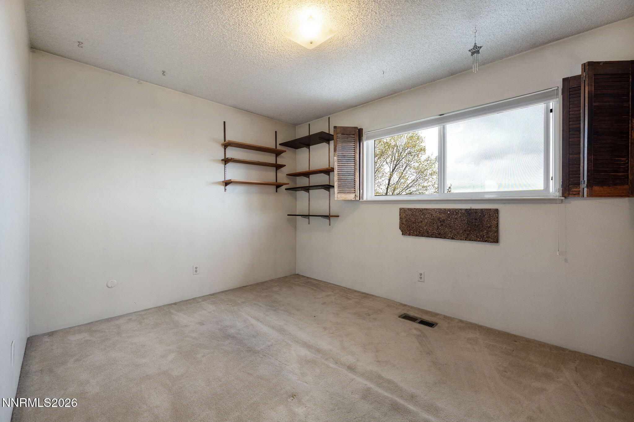 2685 Everett Drive Reno, NV 89503 - Photo 13 of 40 a view of a kitchen with a dishwasher and a window