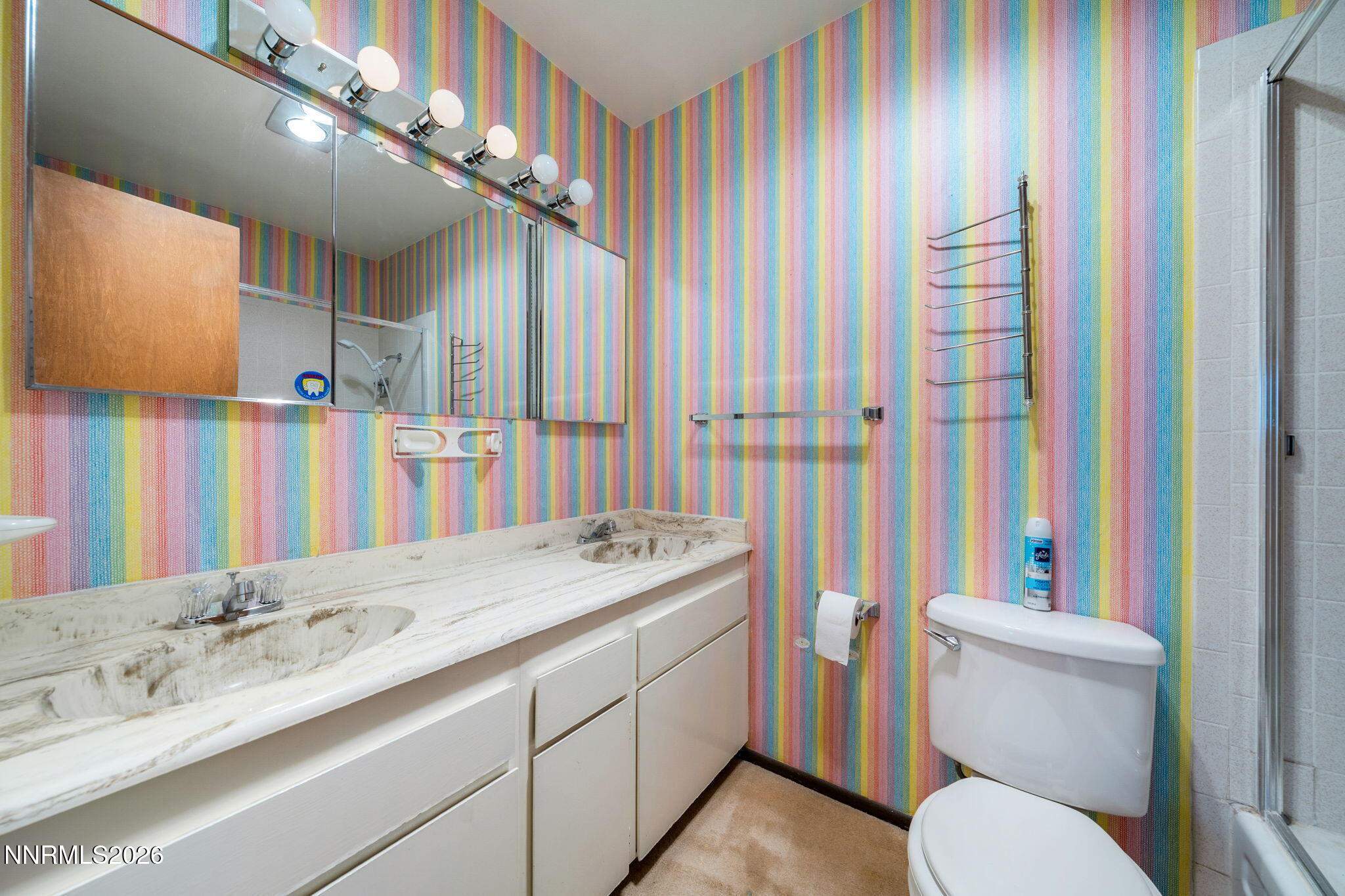 2685 Everett Drive Reno, NV 89503 - Photo 16 of 40 a bathroom with a sink a toilet and a mirror