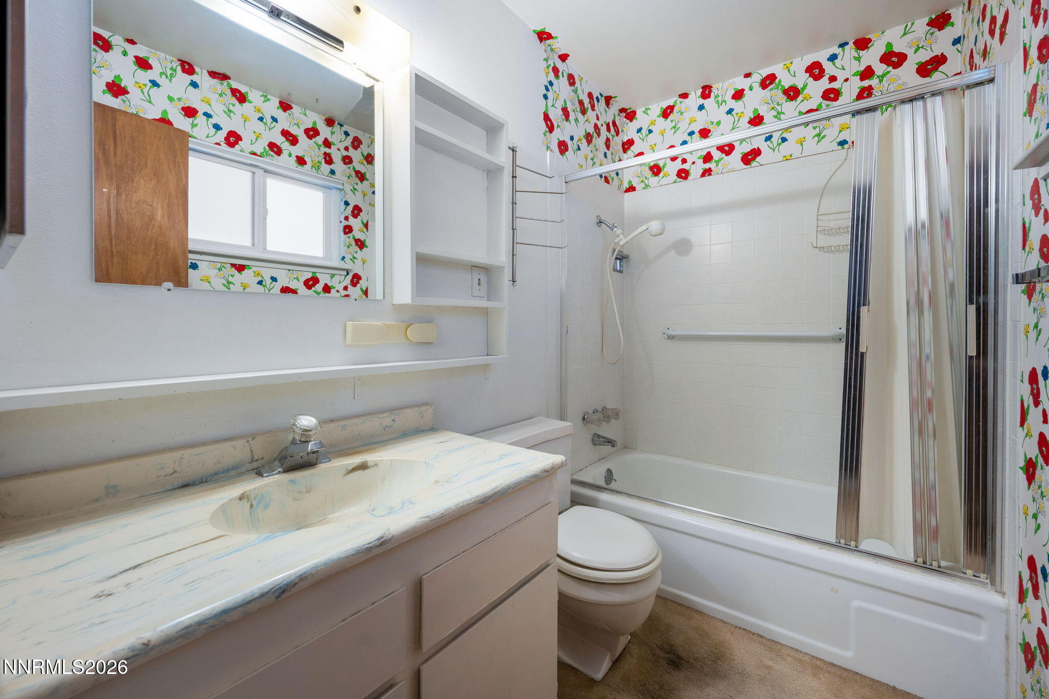 2685 Everett Drive Reno, NV 89503 - Photo 18 of 40 a bathroom with a sink vanity mirror and toilet
