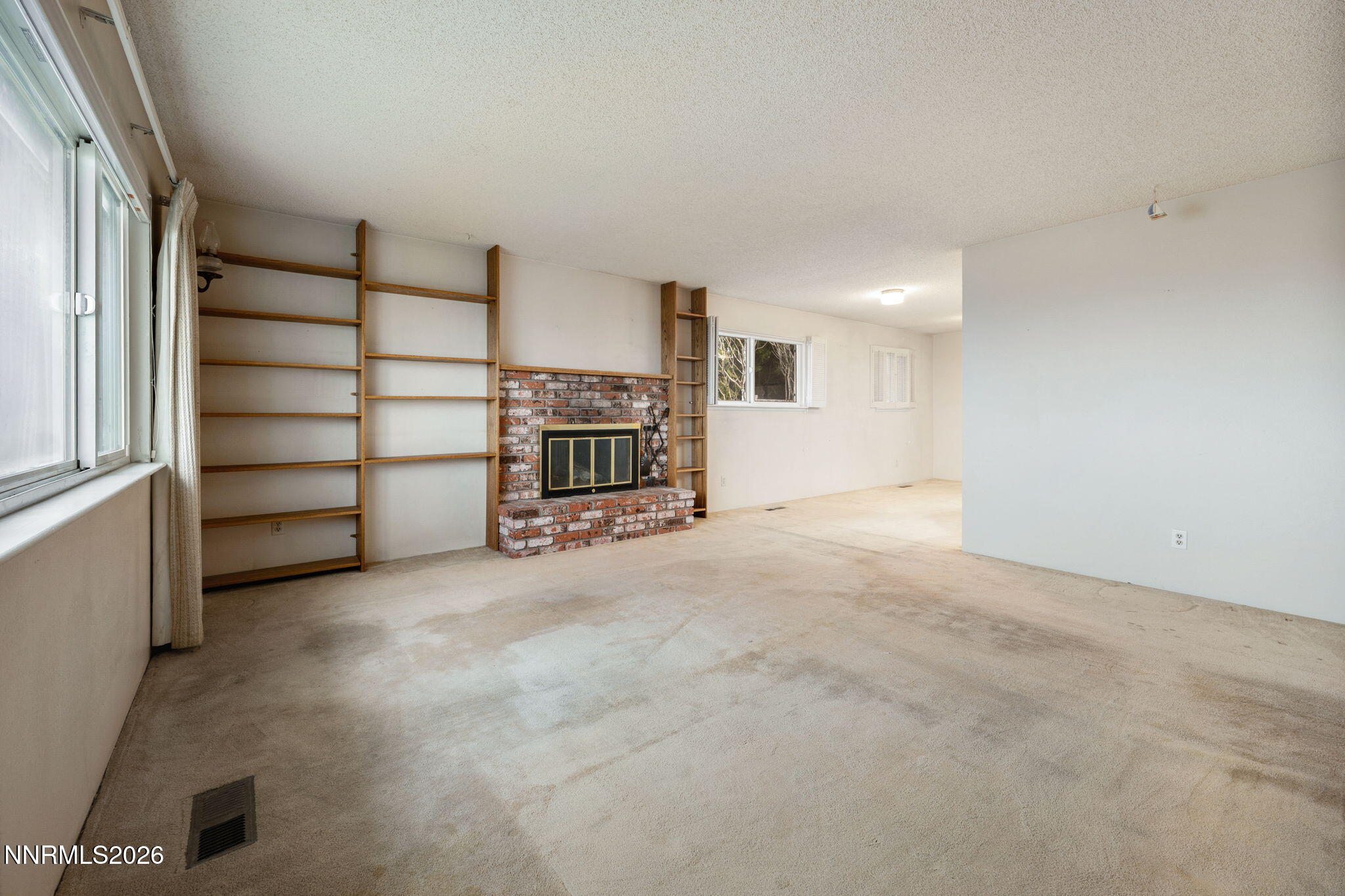 2685 Everett Drive Reno, NV 89503 - Photo 25 of 40 a view of a livingroom with furniture and storage