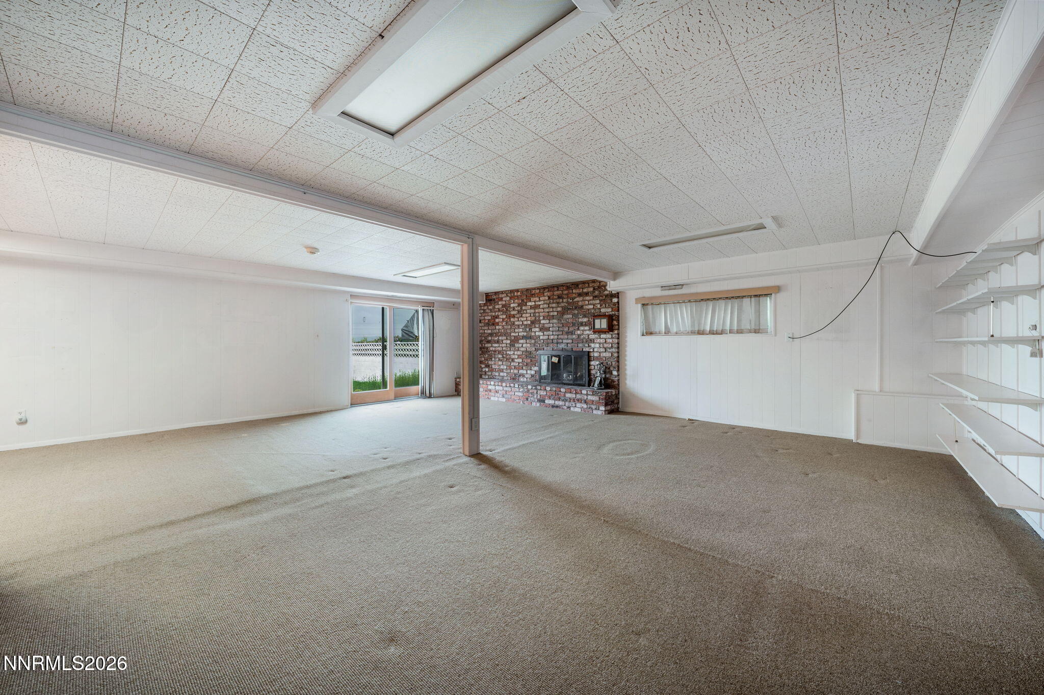 2685 Everett Drive Reno, NV 89503 - Photo 30 of 40 a view of a livingroom with an empty space and a window