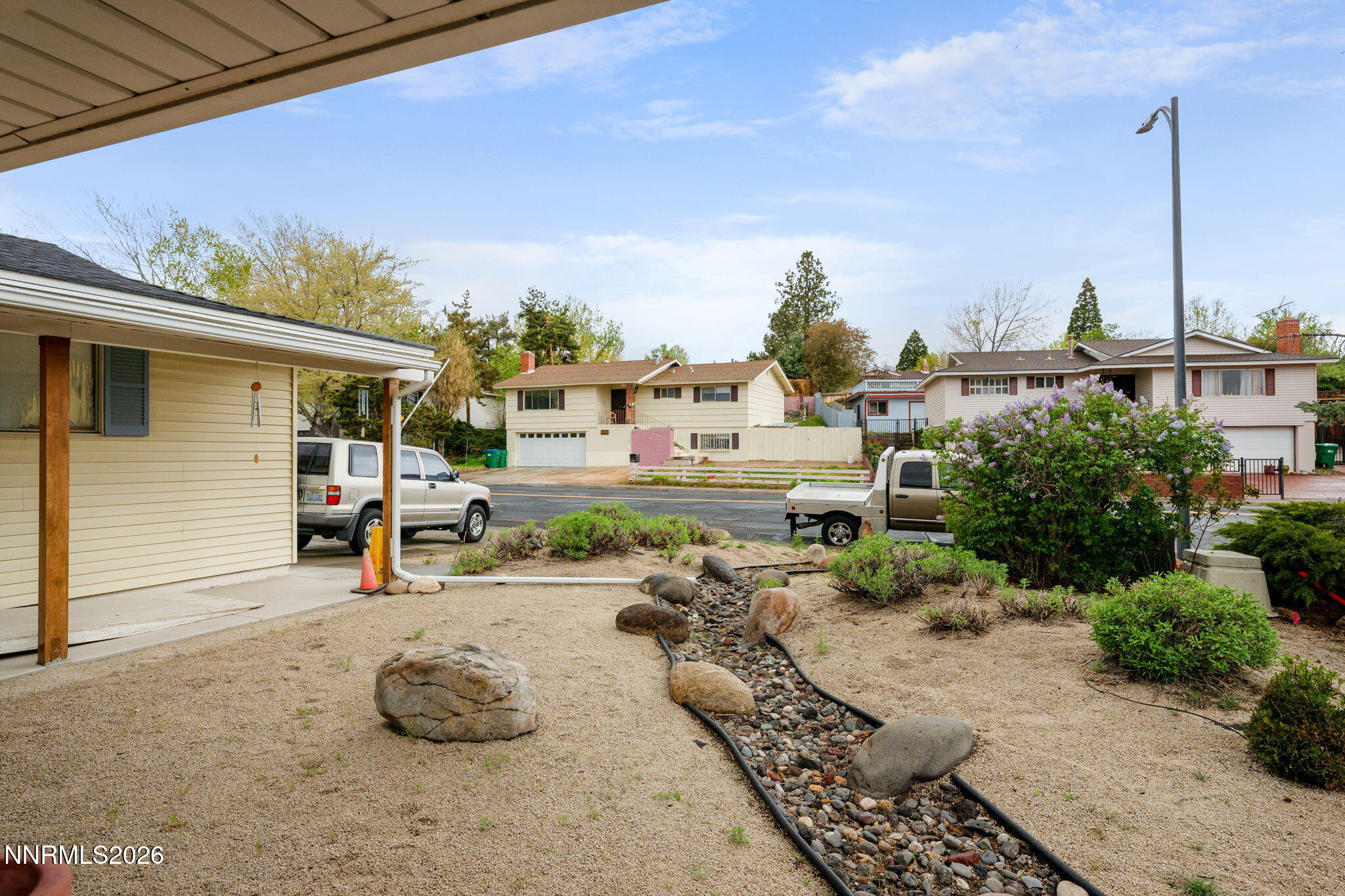 2685 Everett Drive Reno, NV 89503 - Photo 6 of 40 a row of furniture and a table and chairs in the patio