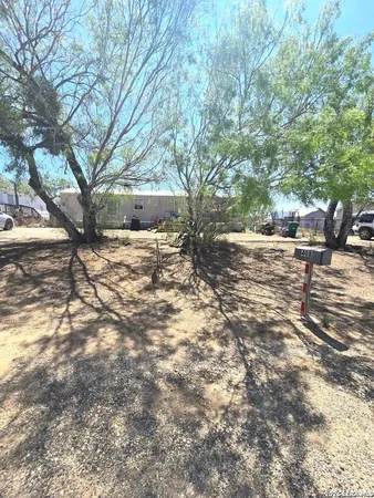 a view of a outdoor space with a tree