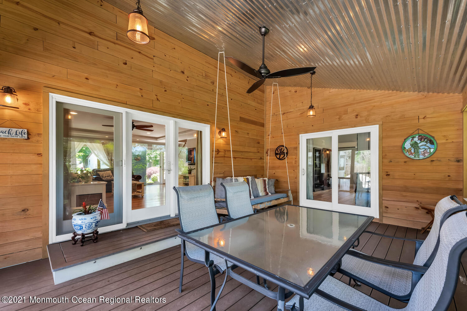 27 Demmert Avenue Rumson, NJ 07760 - Photo 19 of 38 a view of a dining room with furniture wooden floor and chandelier