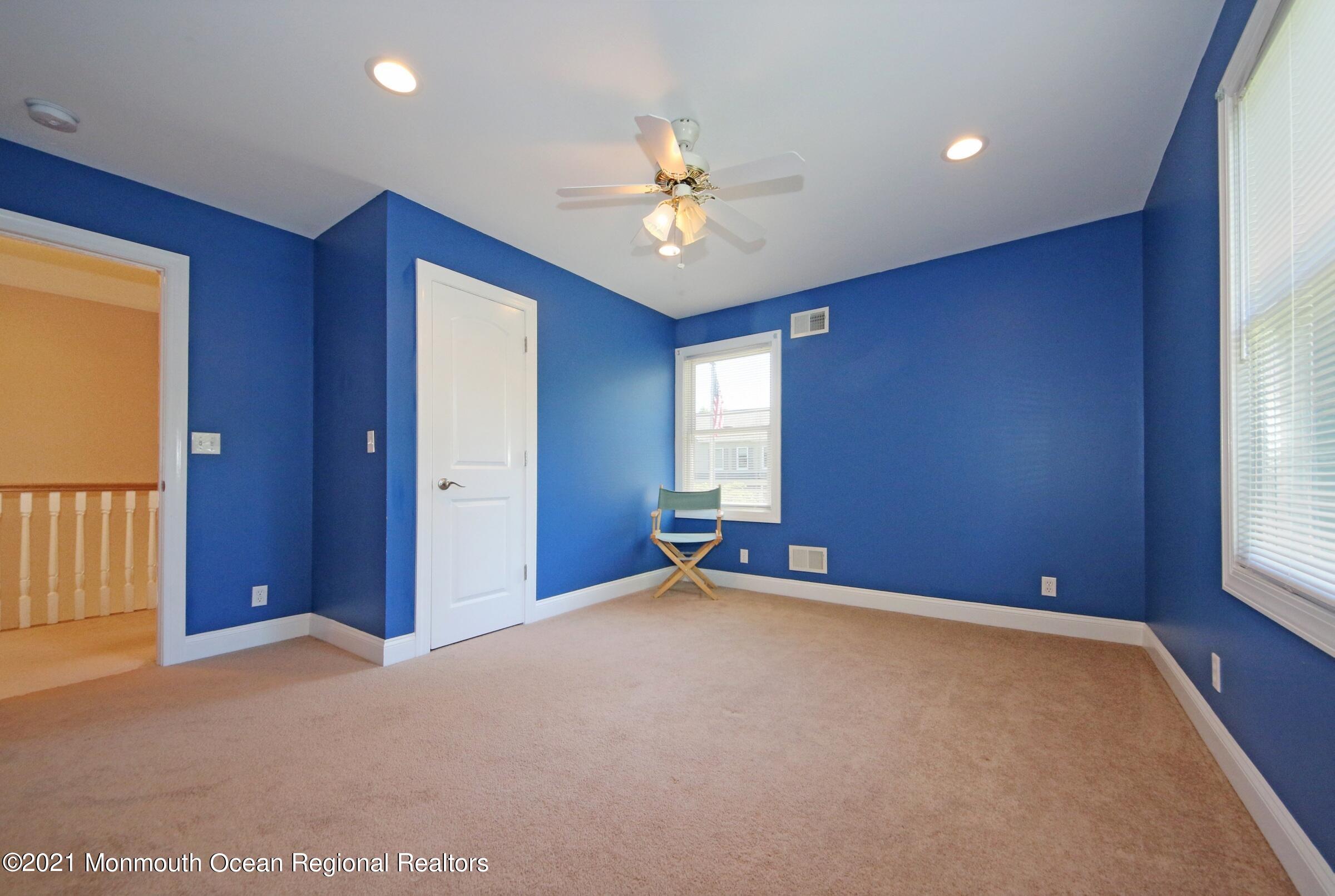27 Demmert Avenue Rumson, NJ 07760 - Photo 10 of 38 a view of an empty room with a window