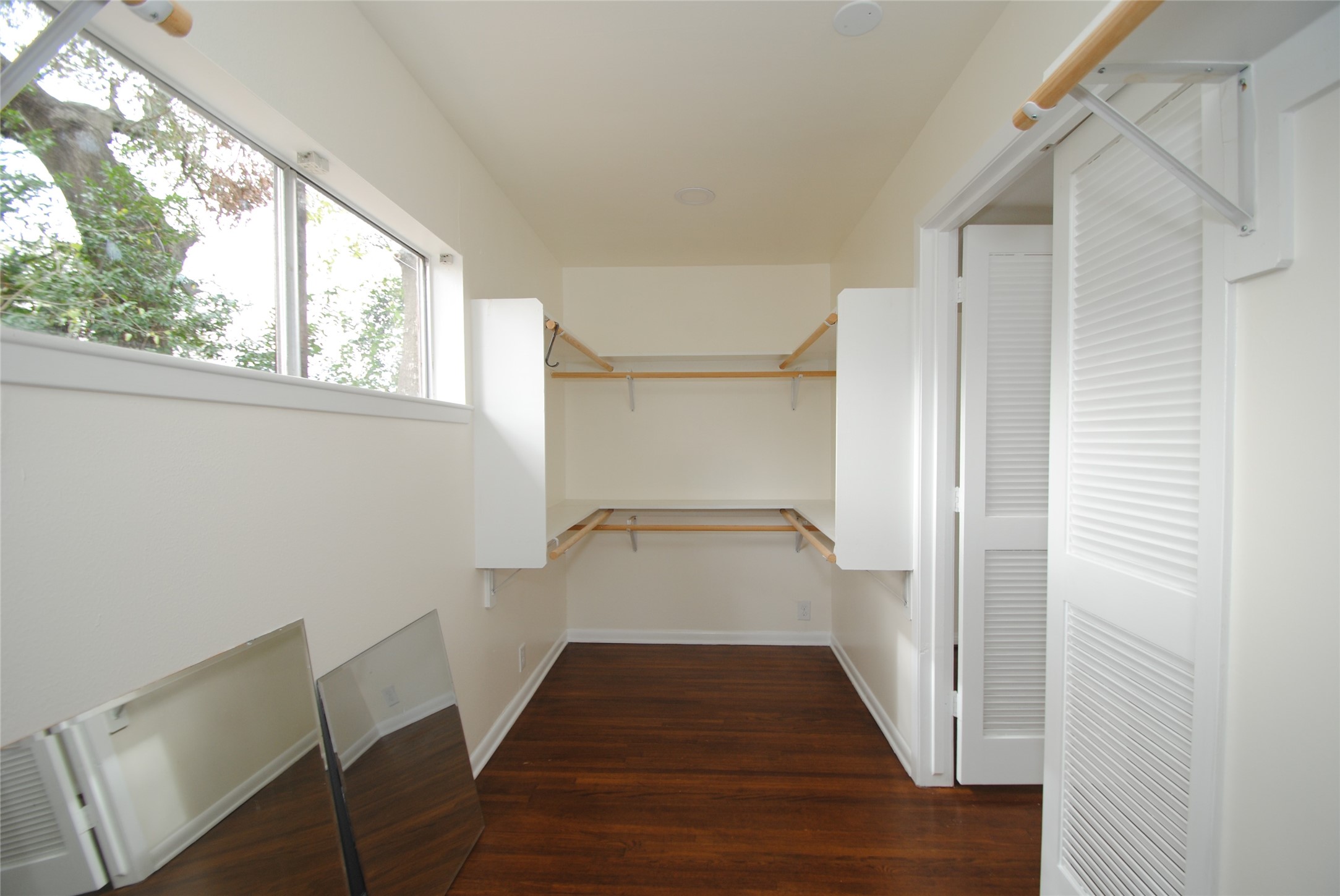 7953 Ridgeview Drive Houston, TX 77055 - Photo 18 of 29 a view of a hallway with wooden floor and staircase