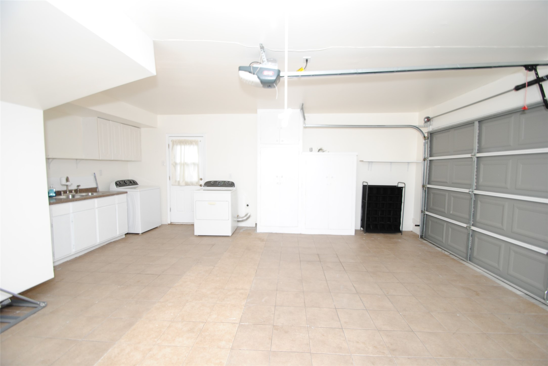 7953 Ridgeview Drive Houston, TX 77055 - Photo 26 of 29 a view of a big room with closet and windows