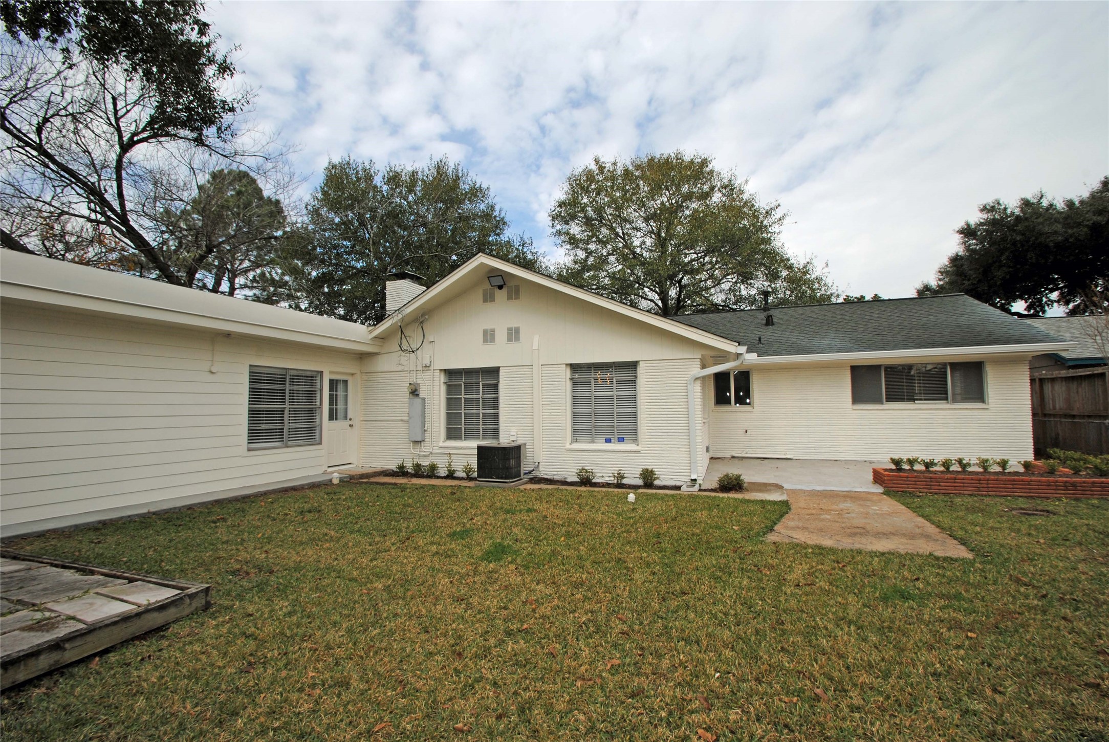 7953 Ridgeview Drive Houston, TX 77055 - Photo 28 of 29 a view of a house with a yard