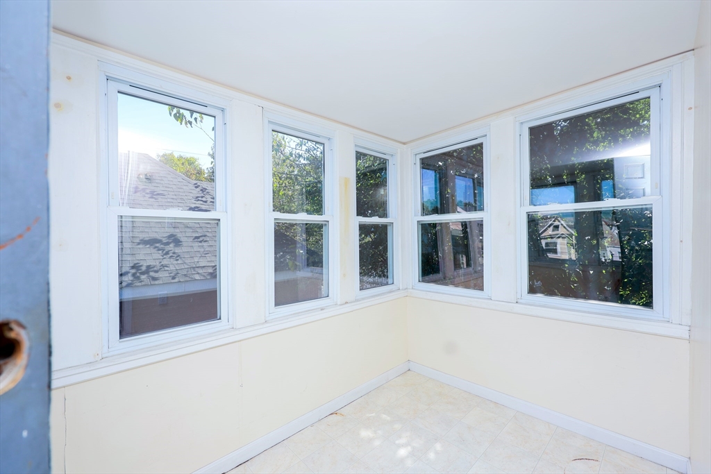 15-17 Saunders Street, Unit 15 Boston, MA 02134 - Photo 12 of 22 a view of an empty room with a window